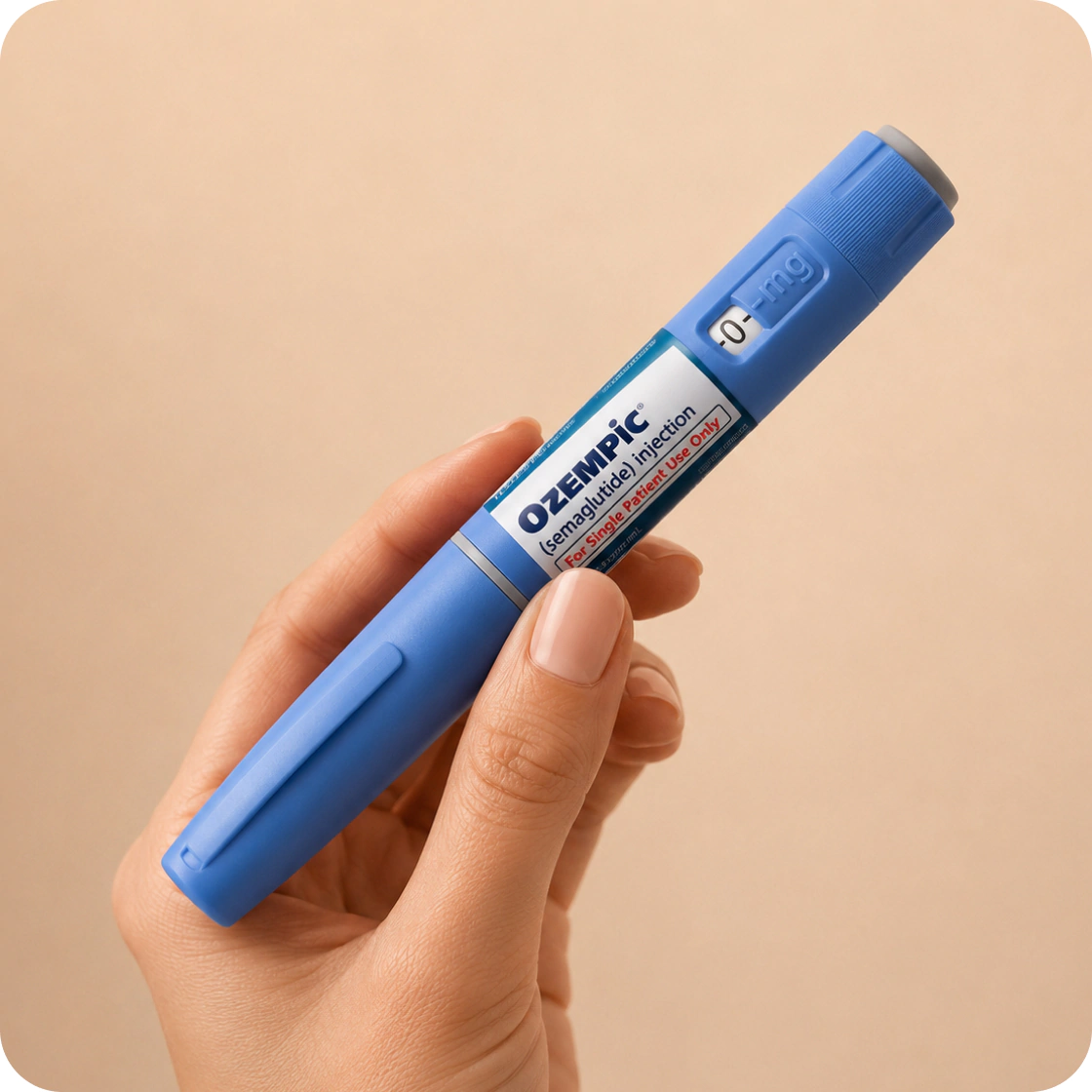 person holding Ozempic injection